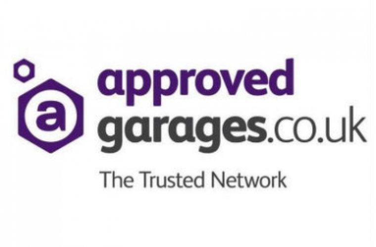 Logo of Approved Garages. The design features a purple hexagon with a lowercase 'a' inside, followed by "approved garages.co.uk" in purple and black. Below, it reads "The Trusted Network" in smaller black text, symbolizing excellence in clutches and MOT testing by expert garage mechanics.