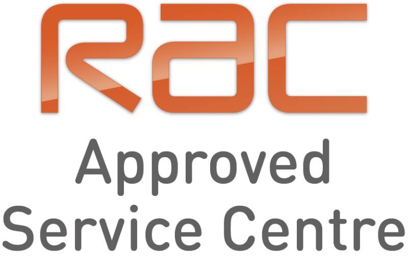 The image features a logo reading "RAC Approved Service Centre" with bold orange "RAC" letters. Below, in a smaller gray font, is "Approved Service Centre," indicating services like MOT Testing and expert Garage Mechanic assistance are available.